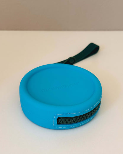 mellowbear【Washable Treats holder】 in blue silicone with zipper design on a white background.