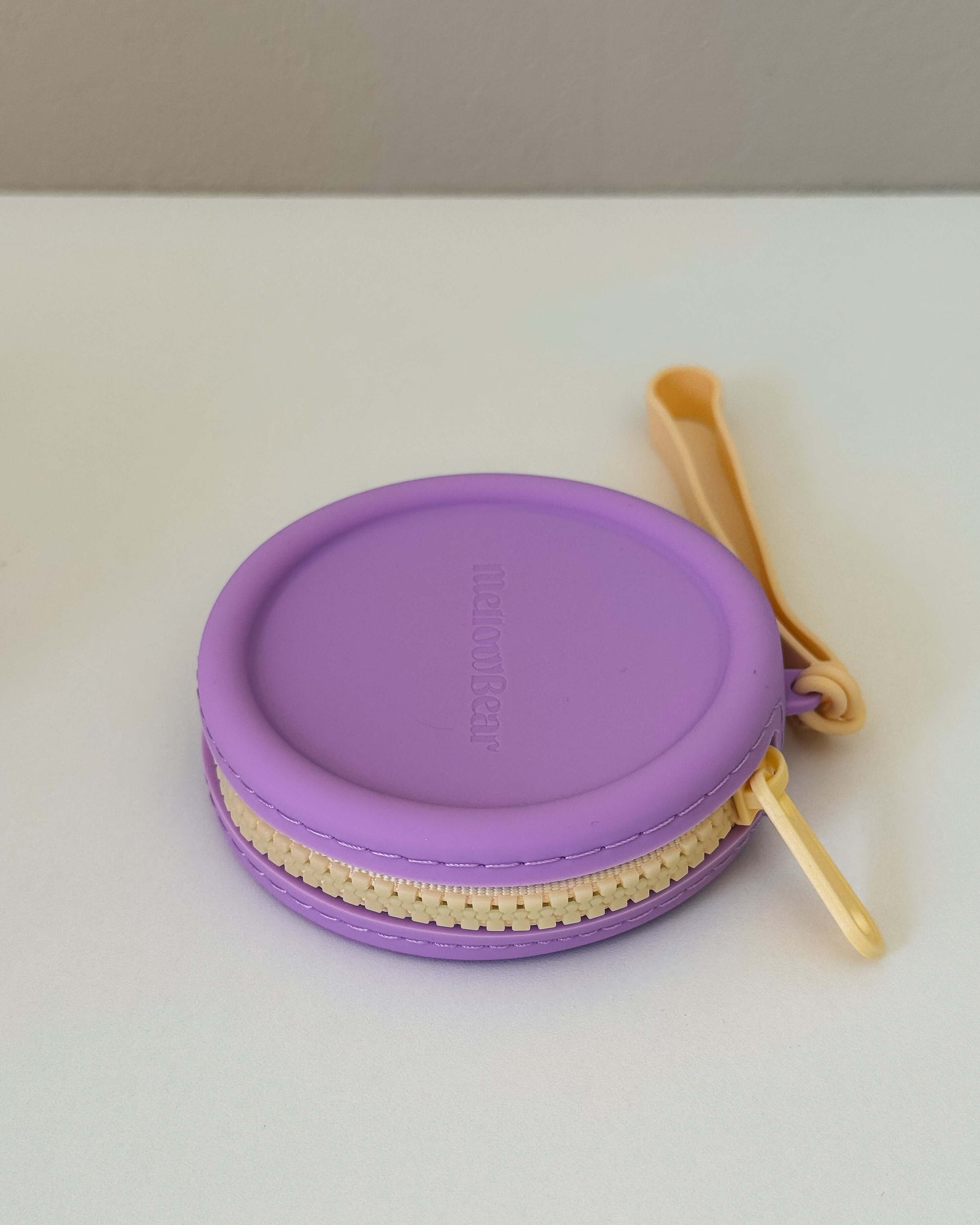 mellowbear【Washable Treats holder】 in purple silicone with zipper, perfect for storing treats.